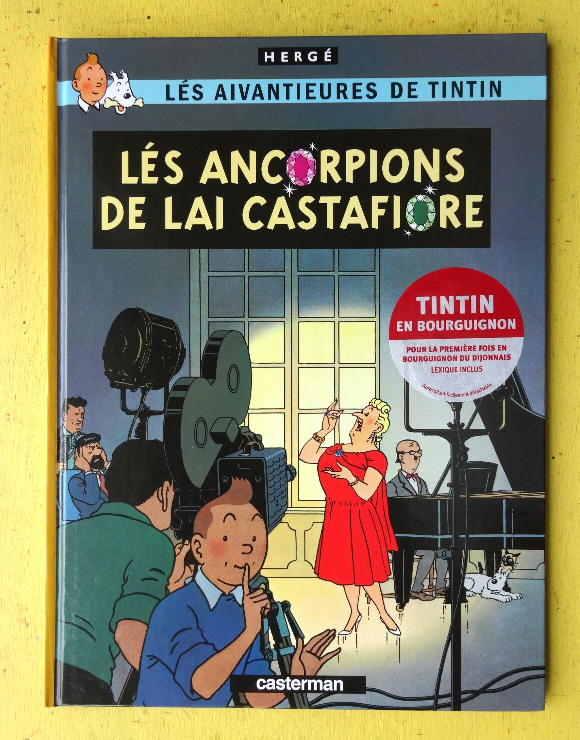 BD  TINTIN lés ancorpions de lai castafiore EO EN BOURGUIGNON  2009 NEUF  F2GE26
