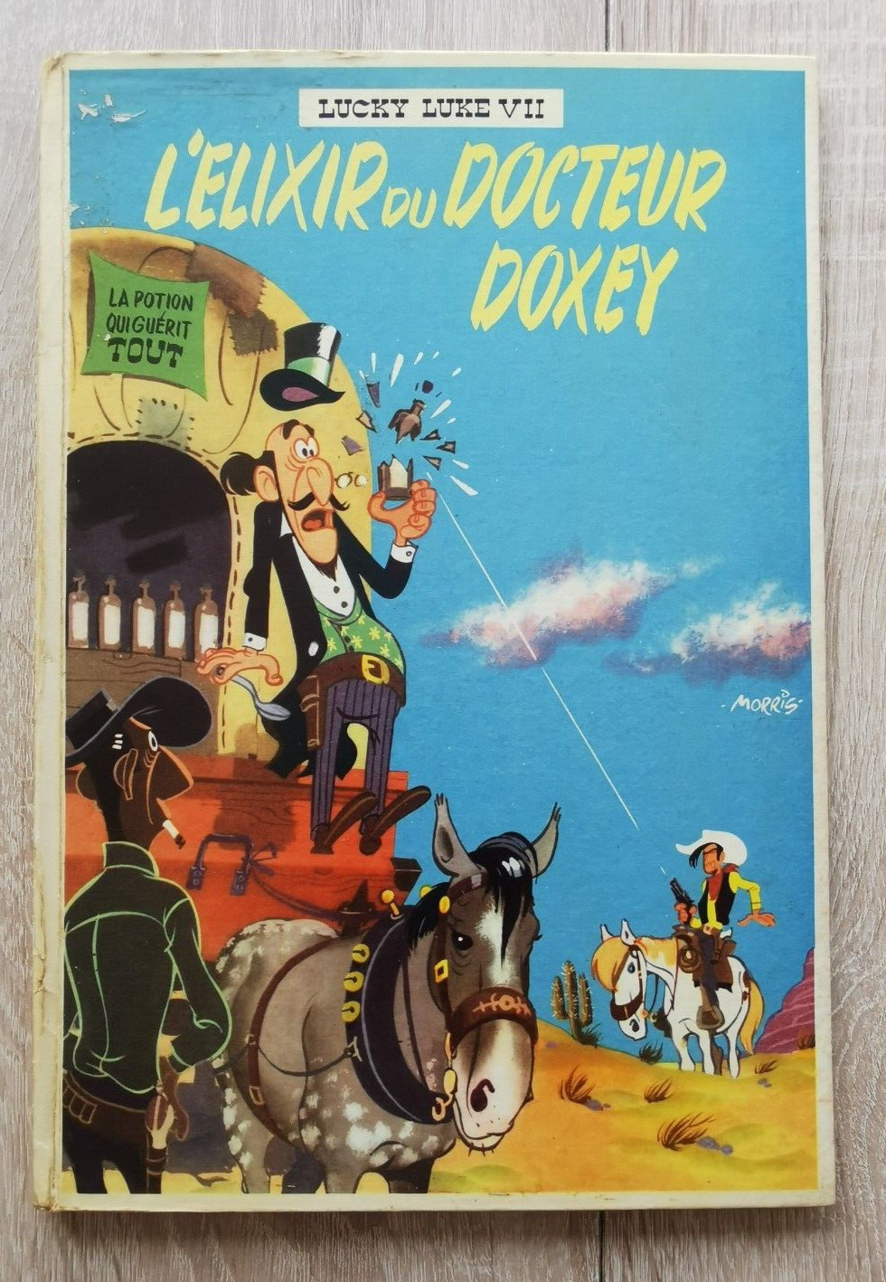 LUCKY LUKE  **T7 L ELIXIR DU DOCTEUR DOXEY ** EO CARTONNEE  1955 MORRIS/GOSCINNY