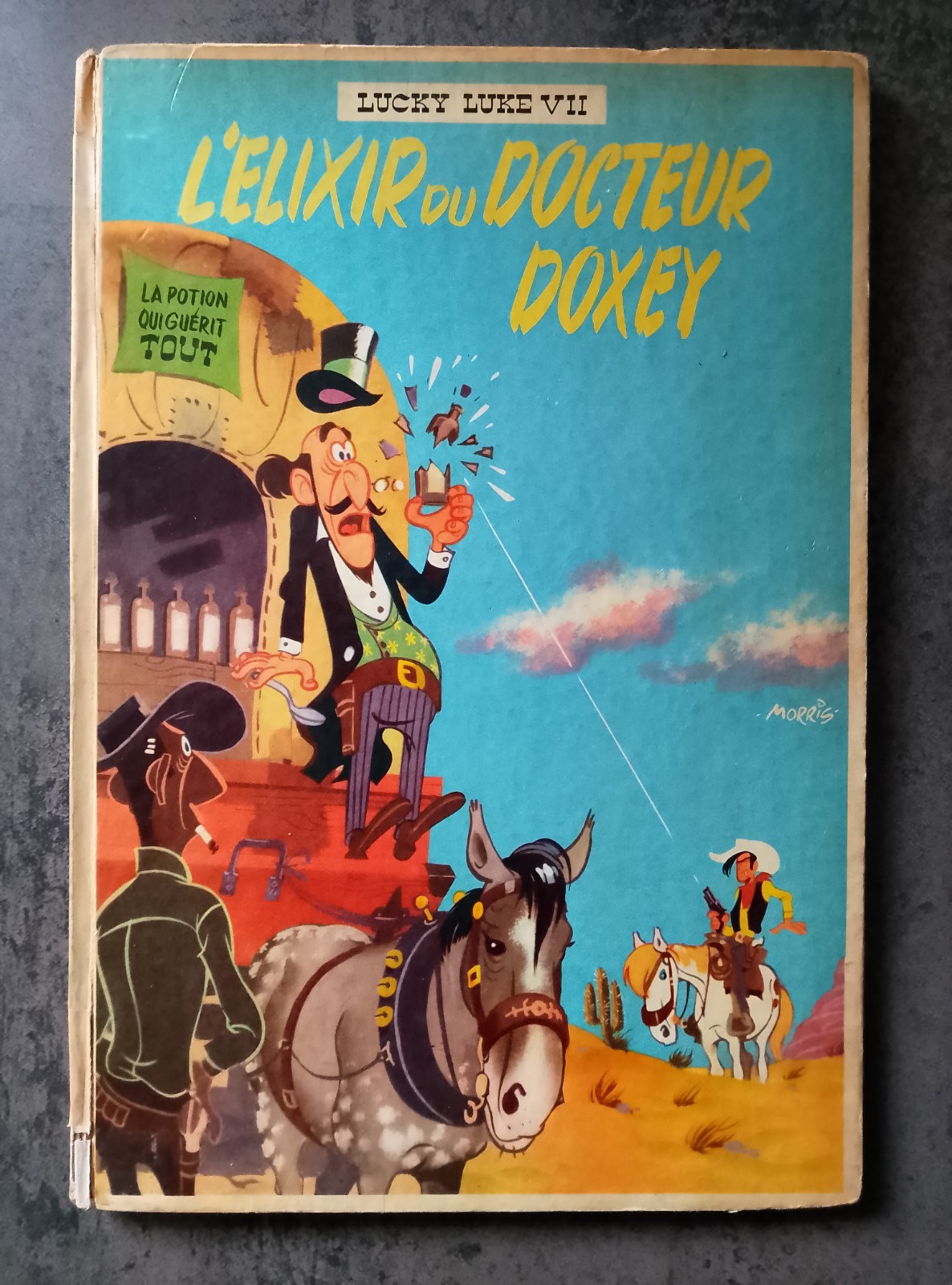 LUCKY LUKE - T7 L'élixir du docteur Doxey - EO cartonnée française - 1955